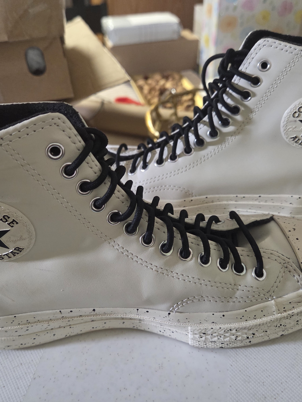 Converse White High-Top Sneakers with Black Heel Stripe